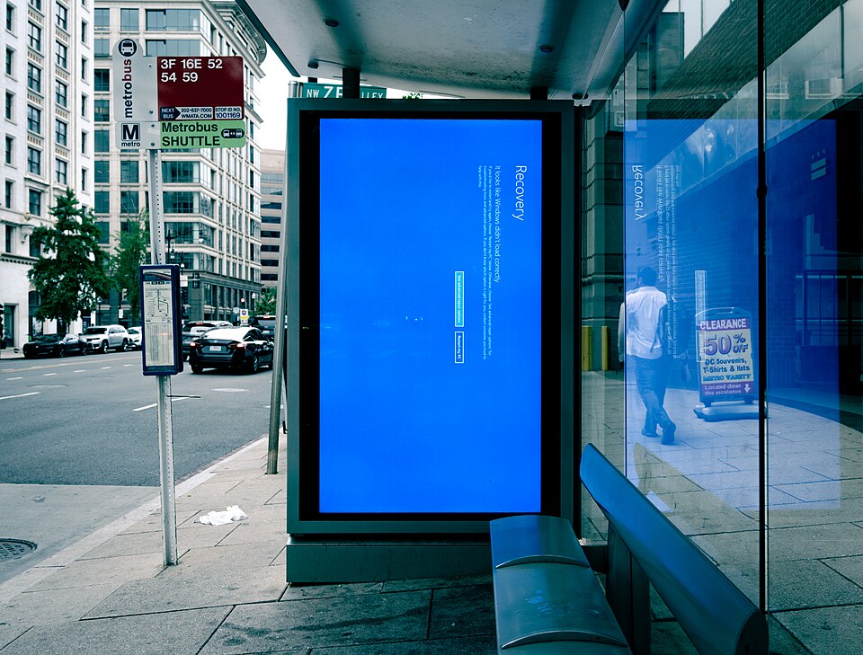 Bus shelter sign in Windows recovery, after Crowdstrike IT meltdown